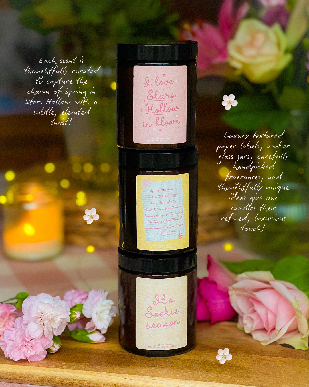 Candle with decorative paper labels on a wooden surface with flowers in the background