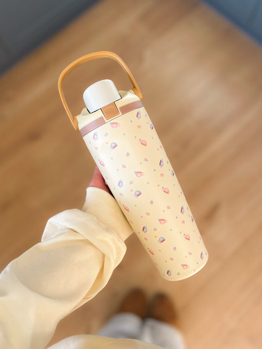Spring at Luke's Butter Yellow Water Bottle